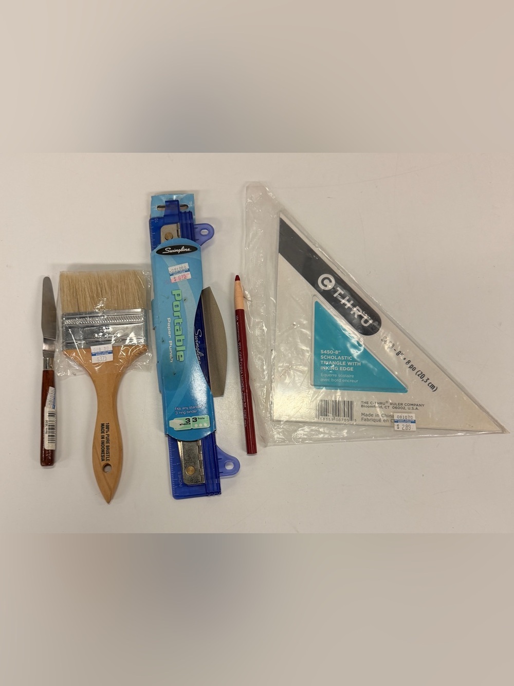Portable Paper Punch in Blue and various art supplies